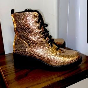 Gold Metallic boots w/black thick heel. Gently loved!